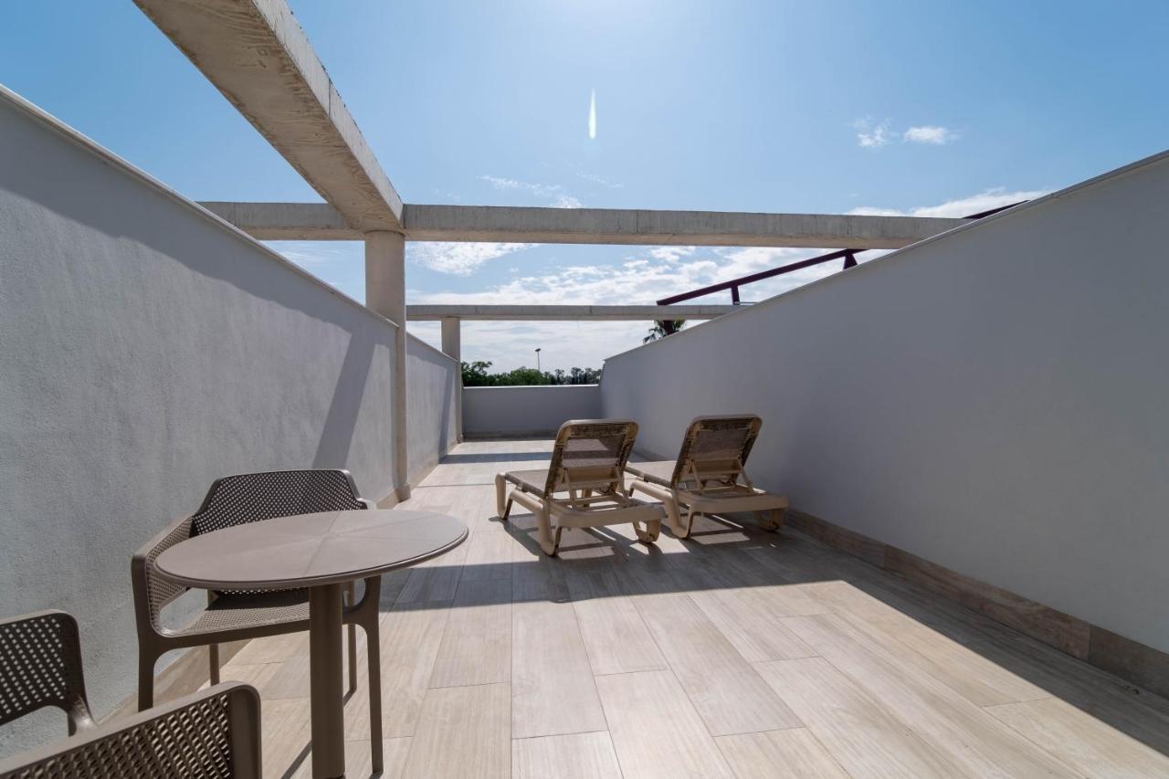 Aljarafe Suites By Qhotels Gelves Bagian luar foto